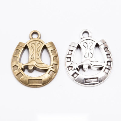 Grouped front view of horseshoe boot charm showing a boot centered inside a rounded horseshoe