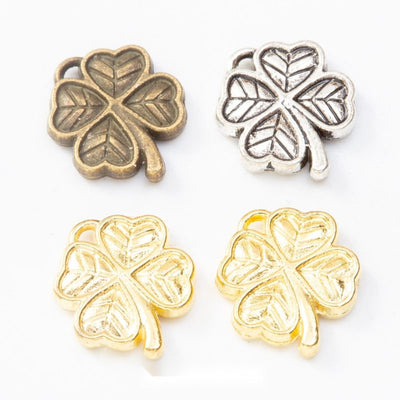 Four leaf clover charm shown across the available finishes