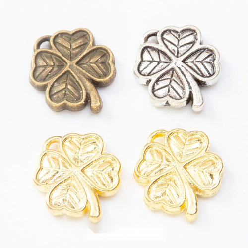 Four leaf clover charm shown across the available finishes