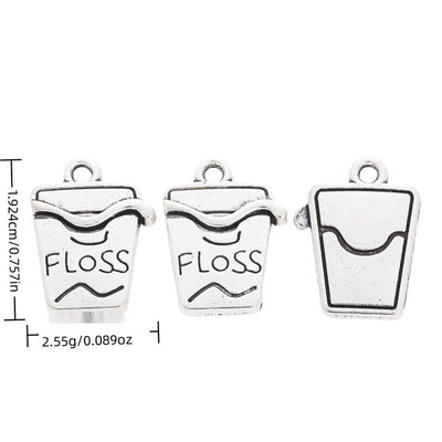 Dental Floss Box metal piece shown in Antique Silver beside printed specifications