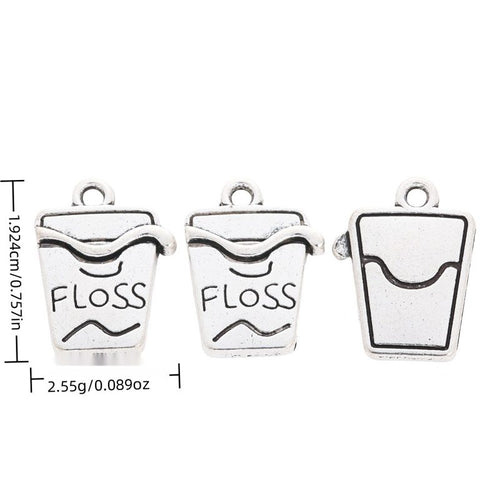 Dental Floss Box metal piece shown in Antique Silver beside printed specifications