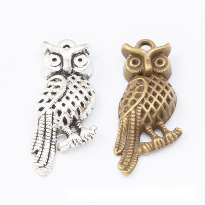 Long owl charm shown across the available finishes