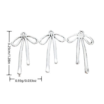 Long Ribbon Bow Alloy Charm in Antique Silver Finish