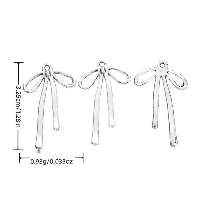 Long Ribbon Bow Alloy Charm in Antique Silver Finish