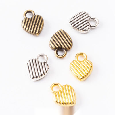 Grouped front views of striped heart charms