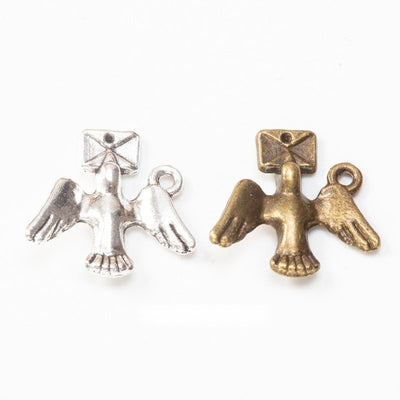 Front and finish comparison of dove and envelope charm