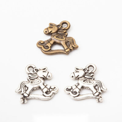 Rocking Horse Charm finish comparison on a white background