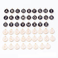 Round Alphabet Enamel Charms in Black and Pink Jewelry Components view 1