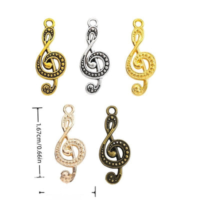 Finish overview of dotted treble clef metal charm