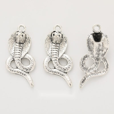 Coiled Cobra Charm pictured option assortment on a white background