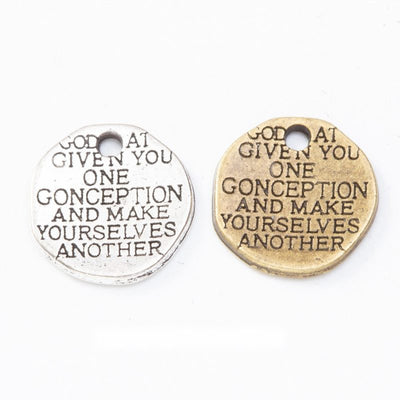 Front and finish comparison of quote disc charm