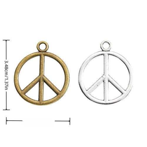 Front-facing arrangement of simple round peace sign charms on a white background