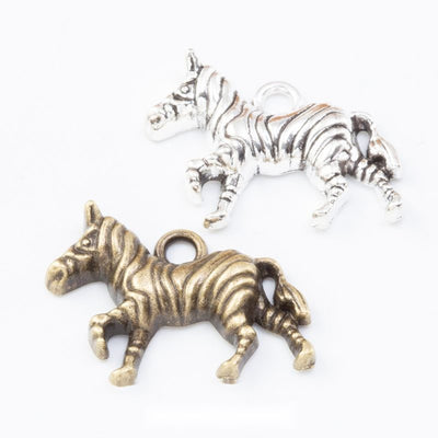 Front comparison of running zebra metal component in 2 finishes