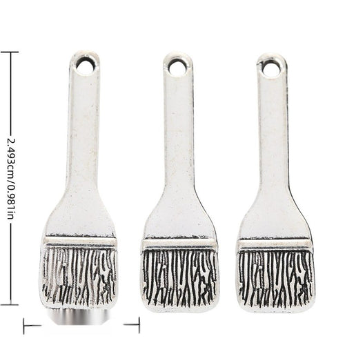 Antique Silver paintbrush charm shown in product image 1