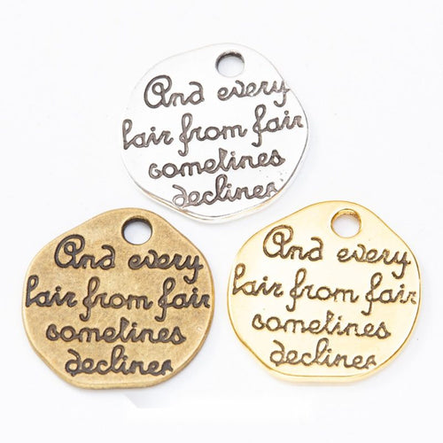 Finish assortment shown together of the round engraved quote tag charm
