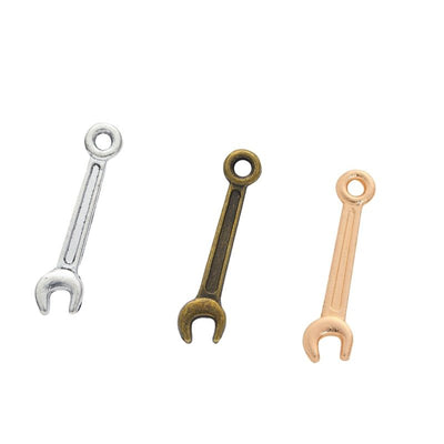 Double Ended Wrench metal piece shown in Antique Bronze, Antique Silver, KC Gold