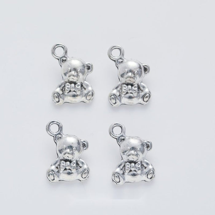 Antique Silver Teddy Bear Charm with Bow and Raised Details