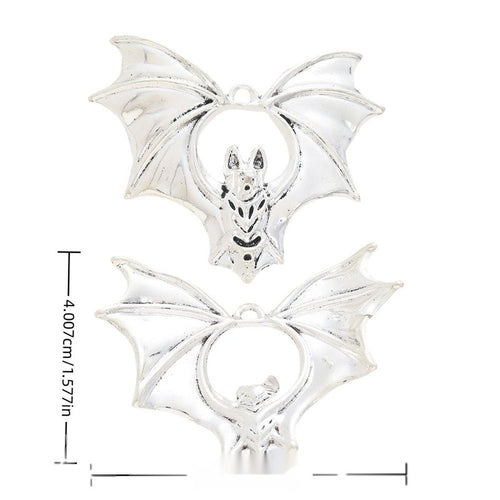Skull Bat metal charm displaying front and reverse sides