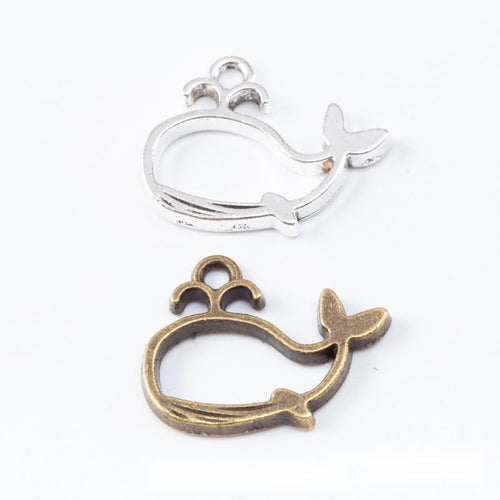 Whale frame charm shown in grouped front views