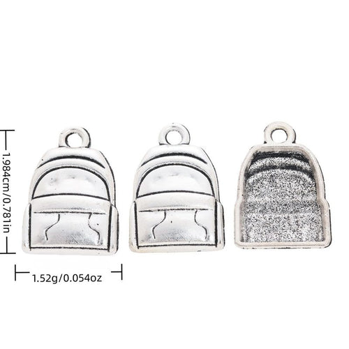 Pocketed Backpack metal piece shown in Antique Silver beside printed specifications