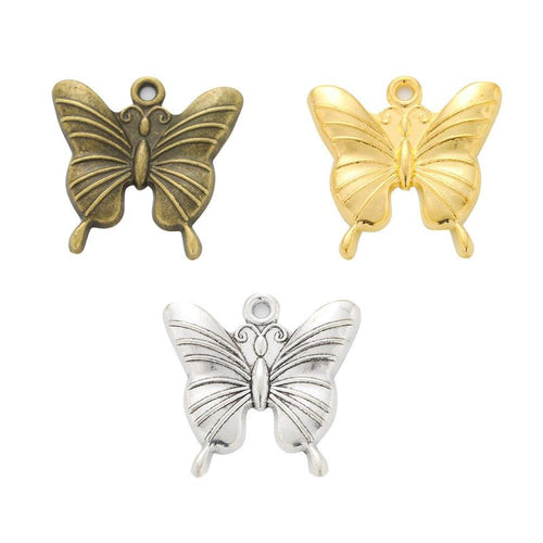 Layered Butterfly Charm assortment showing the available metal finishes