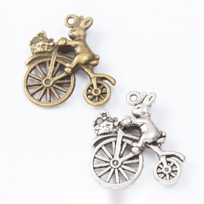 Group view of the rabbit bicycle charm showing the available finishes and front details