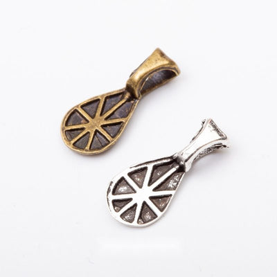 Product photo 1 of the fan pattern bail charm highlighting its open fan-shaped face and broad top bail