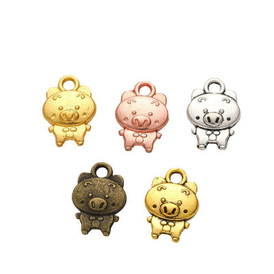 Cartoon Pig Charm grouped finish options on a white background