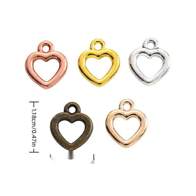 Assorted open heart charms arranged together on a white background
