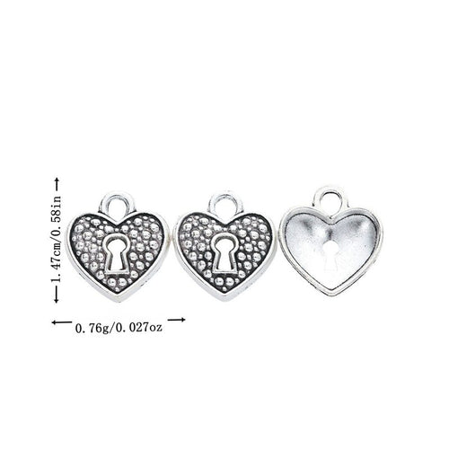 Heart Lock Charm showing a dotted heart face with a keyhole motif