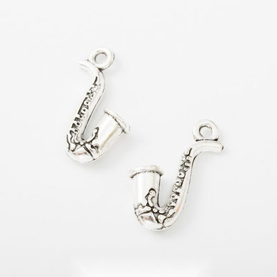 Saxophone Charm finish comparison on a white background