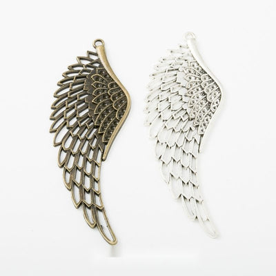 Detailed Feathered Wing Charm assortment showing the available metal finishes