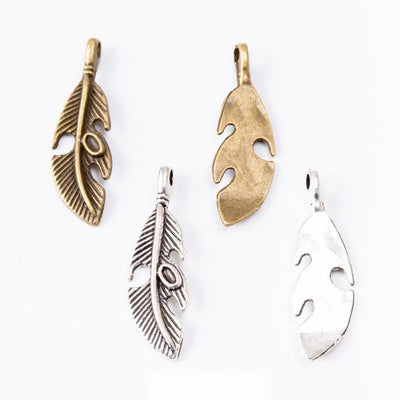 Openwork Leaf Charm finish comparison on a white background