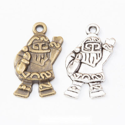 Standing Santa figure with engraved suit and textured reverse shown in the available finishes
