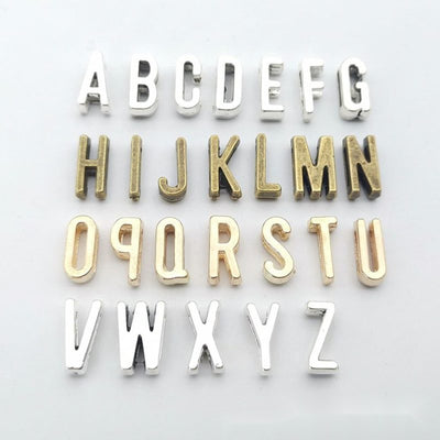 Group view of alphabet letter bead styles on a white background