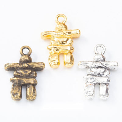 Stacked Stone Figure Charm grouped finish options on a white background