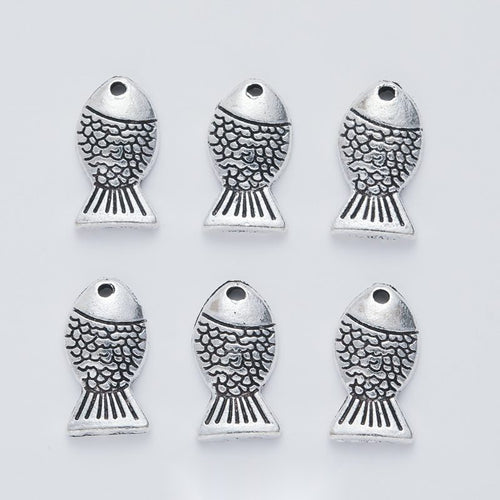 Scaly Fish metal piece showing overall shape and available finishes