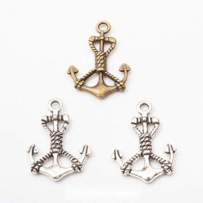 Product view of rope-wrapped anchor charm showing an anchor wrapped with raised rope details and finished with a round t