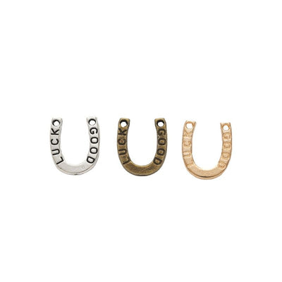 Front and finish comparison of lucky horseshoe charm