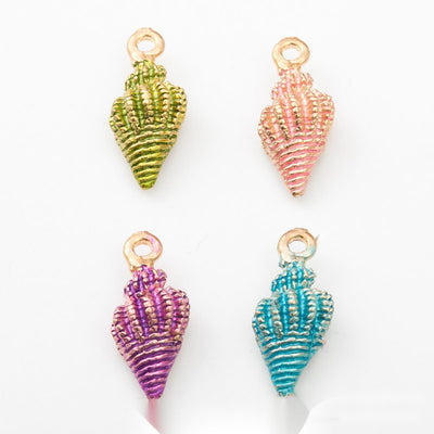 ribbed conch shell metal charms in four bright colors shown together in the available finishes