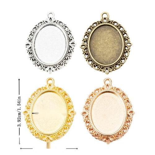 Assorted gold, antique bronze, antique silver and light gold ornate oval cabochon pendant tray pieces on white