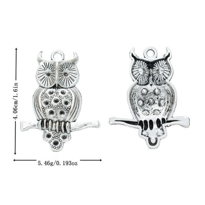 Front view of perched owl charm showing finish variation 1