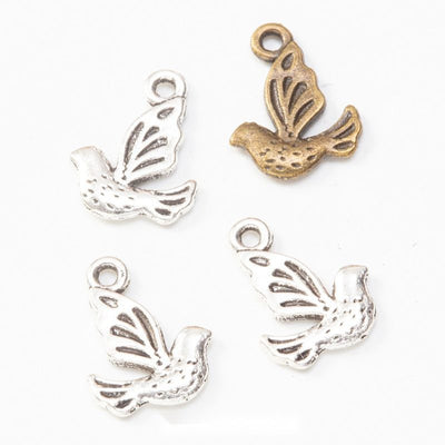 Front and finish comparison of flying bird charm