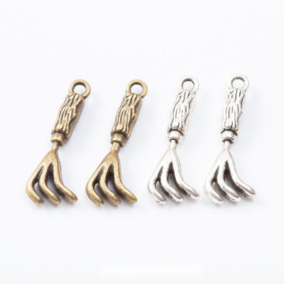Group view of the whisk charm showing the available finishes and front details