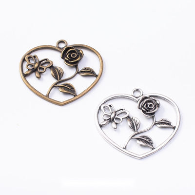 Front comparison of open heart with two roses metal component in 2 finishes