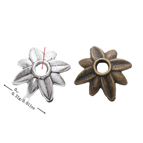 Eight-petal flower bead cap with a raised central opening shown in arranged finish comparison
