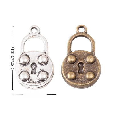 Product view of round padlock charm showing a round padlock with four raised studs, a keyhole, and a fixed top loop