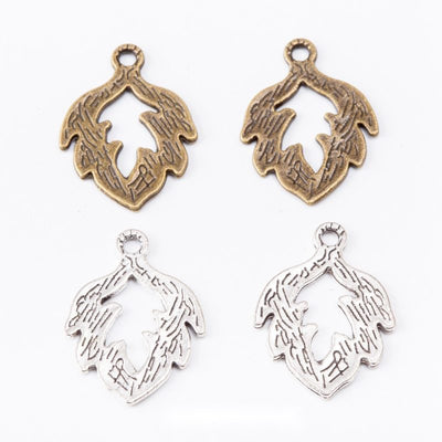 Outlined maple leaf with cutout center and veined edges shown in the available finishes