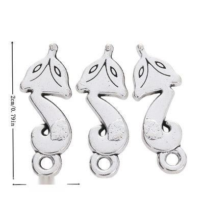 Product image showing the two loop fox metal connector charm and its visible metal details