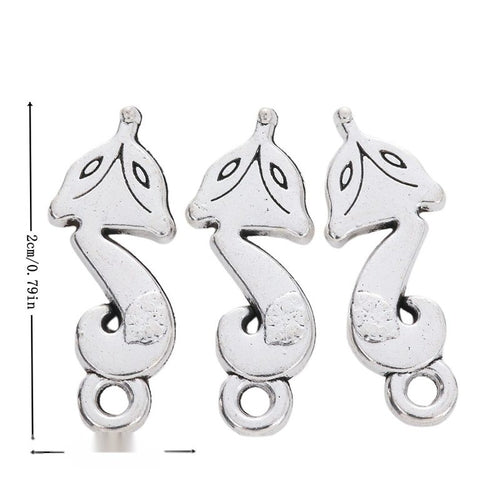 Product image showing the two loop fox metal connector charm and its visible metal details